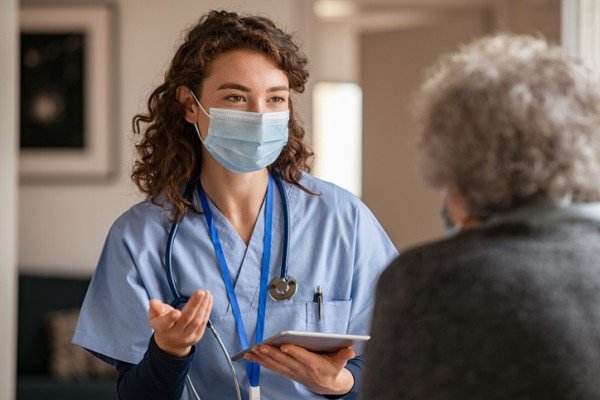 Doctor talking to patient..